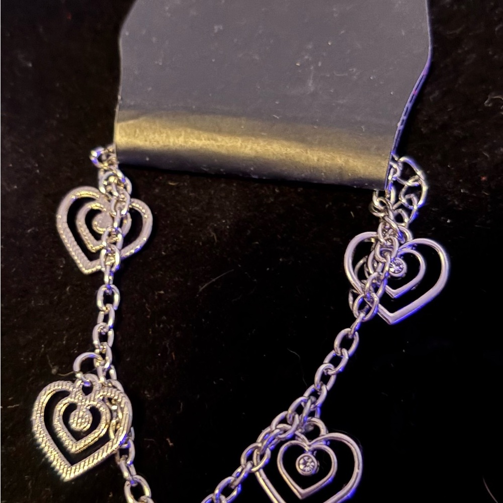 “Unbreakable Hearts” - White Paparazzi Silver Heart Charm Bracelet